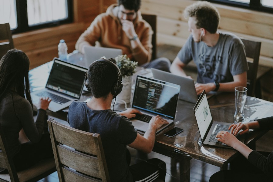 Small business colleagues collaborating around a table